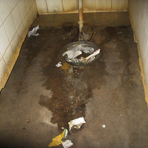 How do you clean up raw sewage and what do you do with it?