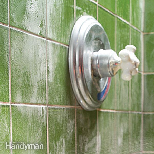 How to clean hard water deposits in the bathroom?